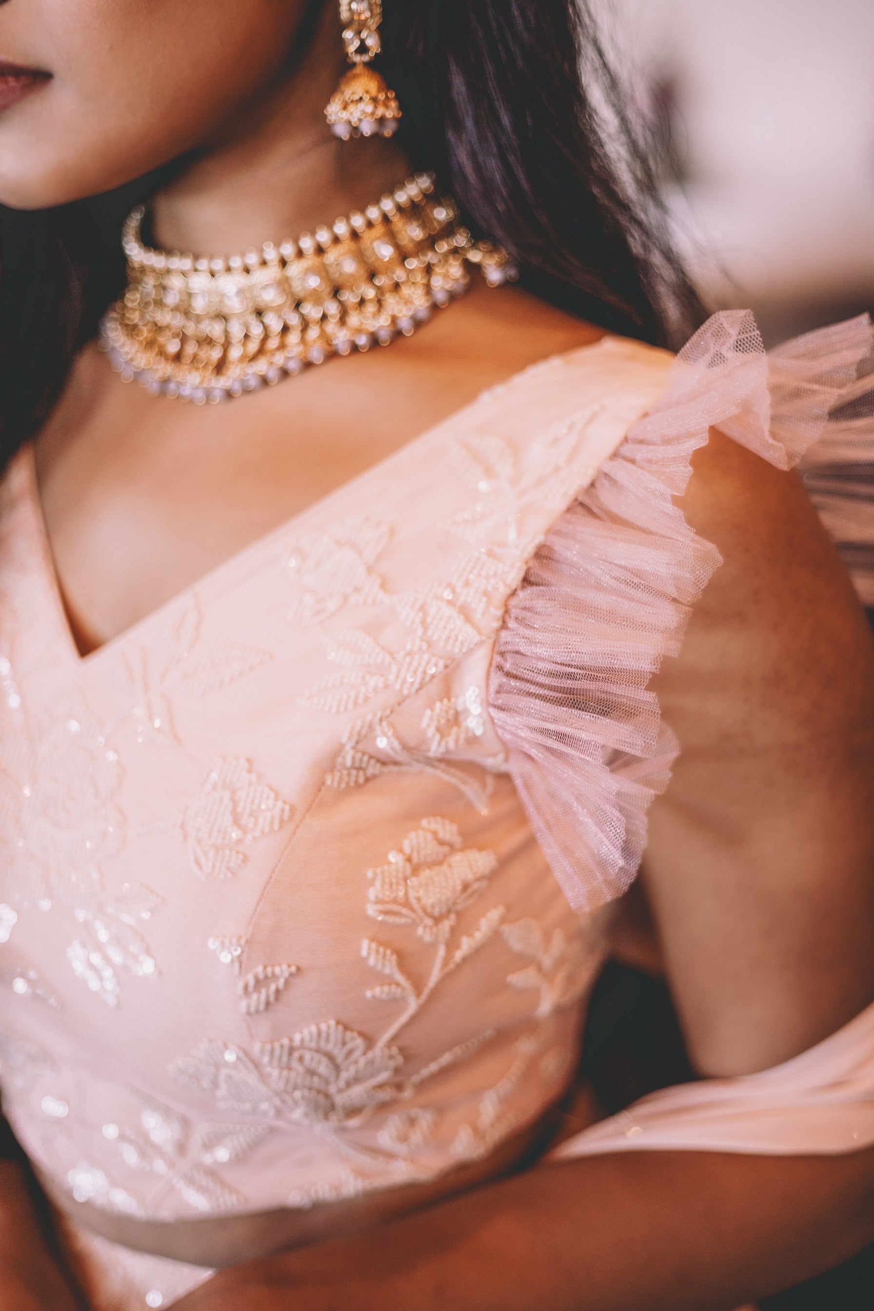 Sexy Peachish Pink V Neck Blouse with Net Fringe Sleeves - Custom Made Bridal Reception Outfit By Sushma Patel