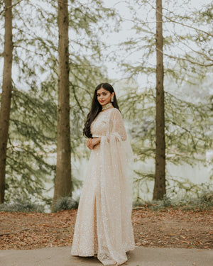 Champagne White Signature Lehenga Choli in Soft Swiss Net & Embellished with Pearls and Sequins - Aurelia by Sushma Patel