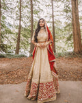 Indian Bridal Wedding Lehenga in Champagne Gold Sequins Fabric And Gold Zardosi Hand Embroidery Red Border - Sushma Patel