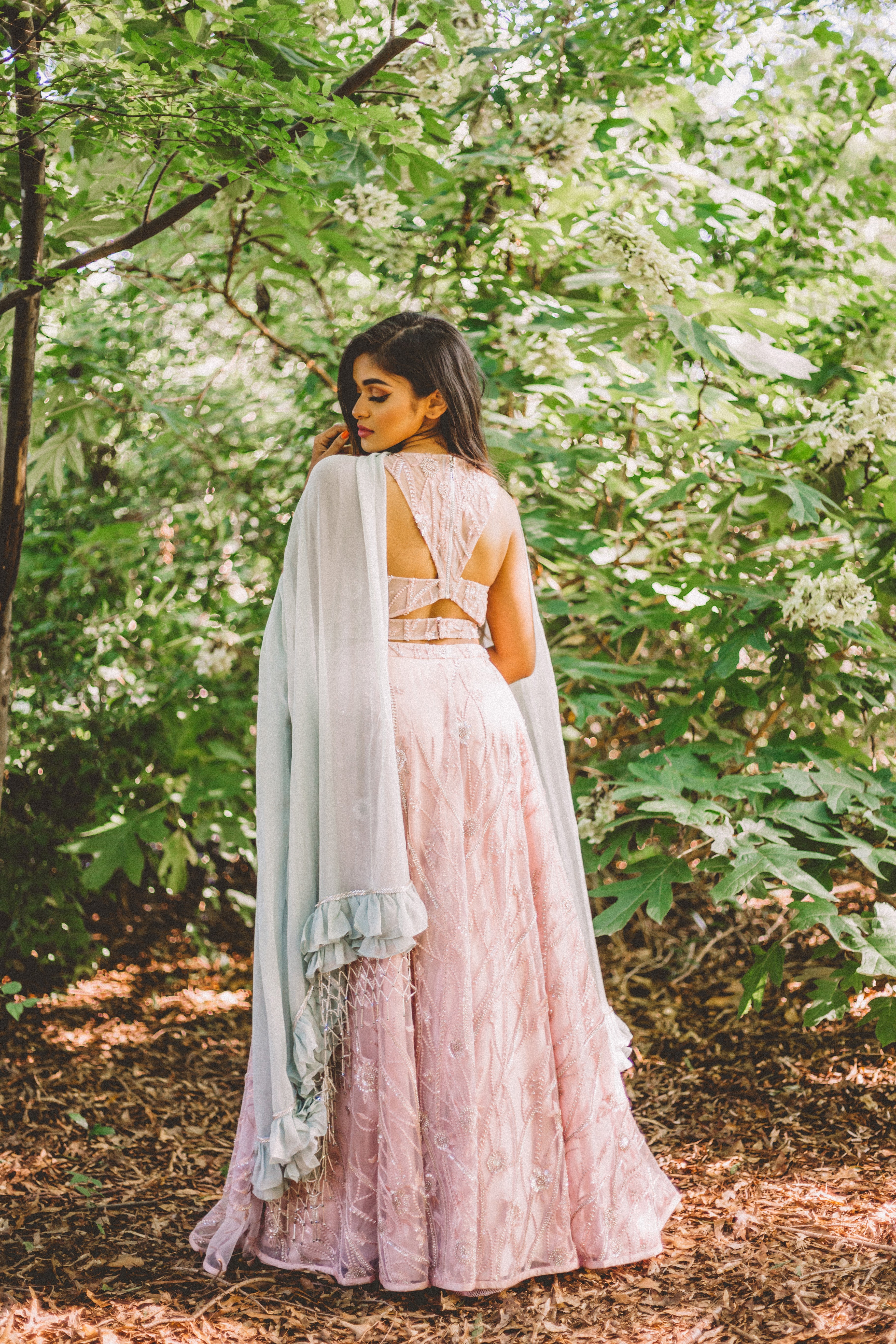 Lavender Pink Lehenga With Sexy Back Blouse And Pastel Green Ruffle Dupatta - Available At Sushma Patel Boutique in Atlanta, USA